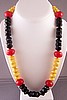 BN27 faceted cream/black/red bakelite necklace